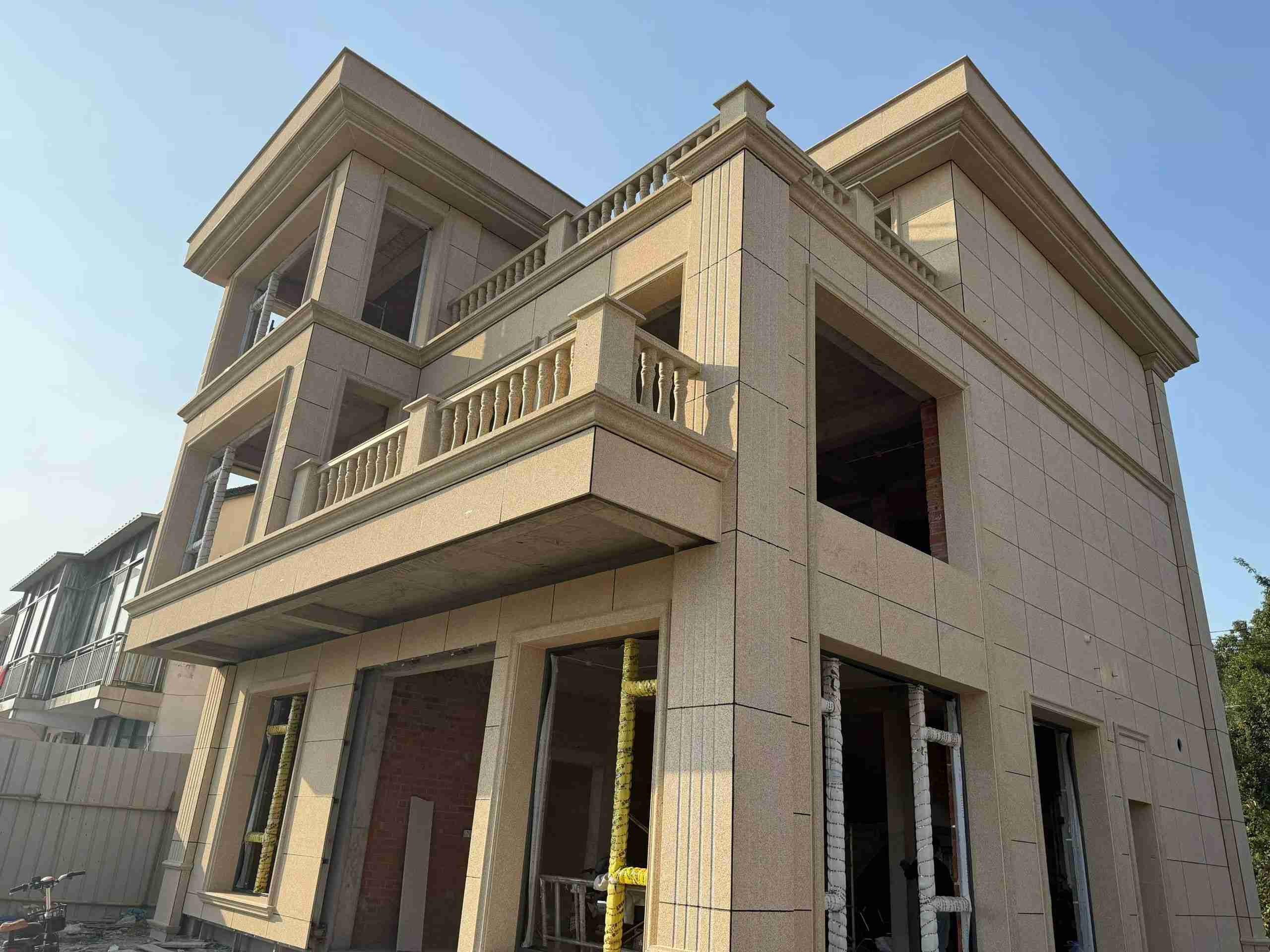 百色 黄金麻花岗岩石材荔枝面外墙干挂效果展示